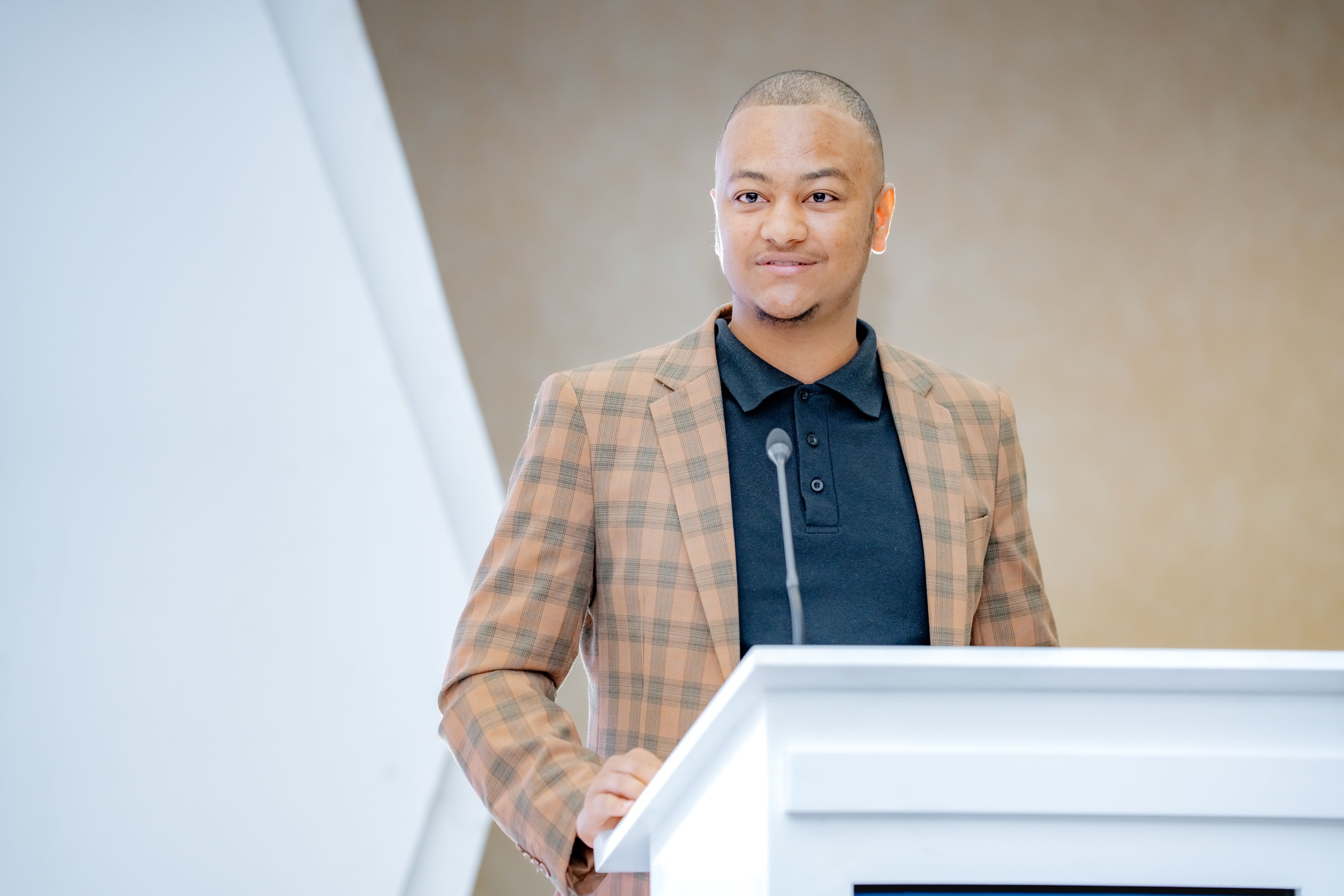 Maverick Kabelo speaking at a lectern at the Business and Leadership Expo 2026.